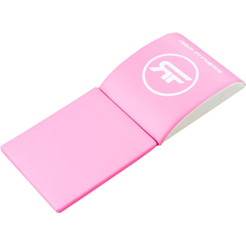 imageREP Fitness Ab Mat Sit Ups Exercise Equipment for Core Training Thick Foam Pad for Home Gym Workouts Lumbar Support Cushion for Back Pain Relief Compact Fitness Mat for Abs Floor RoutinesPink With Tailbone